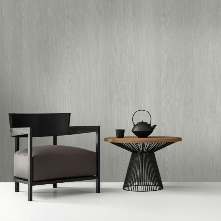 Vista mockup del vinilo Montecarlo Light Grey aplicado a una superficie efecto madera